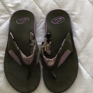 Reef sandals with bottle opener on sole